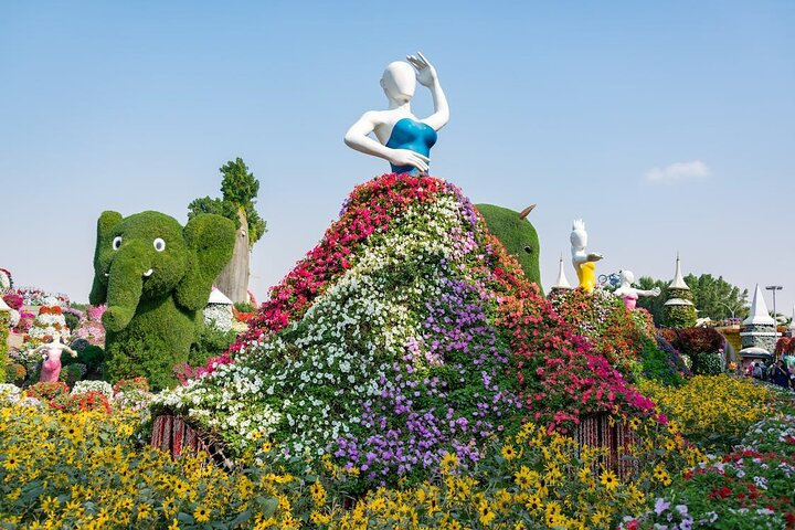 A stunning blend of artistry and nature awaits at Dubai Miracle Garden featuring unique floral sculptures and lush greenery that delight visitors of all ages in a picturesque setting.